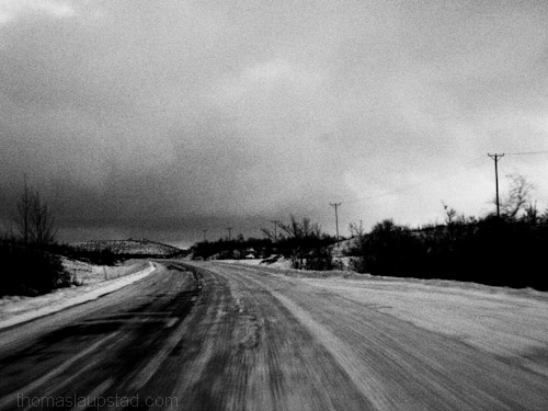 Black and white picture from winter road trip in Northern Sweden